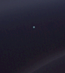 Pale blue dot among the glories of the Saturn system. Cassini, 1.5 billion kilometers from Earth.